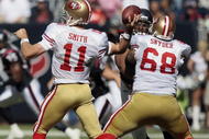 HOUSTON - OCTOBER 25:  Quarterback Alex Hill #11 of the San Francisco 49ers throws down-field against the Houston Texans at Reliant Stadium on October 25, 2009 in Houston, Texas.  (Photo by Bob Levey/Getty Images)