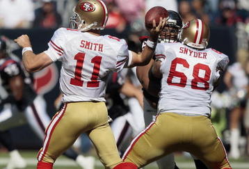 HOUSTON - OCTOBER 25:  Quarterback Alex Hill #11 of the San Francisco 49ers throws down-field against the Houston Texans at Reliant Stadium on October 25, 2009 in Houston, Texas.  (Photo by Bob Levey/Getty Images)