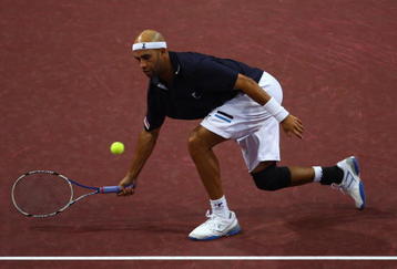 BASEL, SWITZERLAND - NOVEMBER 04:  James Blake of USA plays a volley in his match against Jeremy Chardy of France during Day Three of the Davidoff Swiss Indoors Tennis at St Jakobshalle on November 4, 2009 in Basel, Switzerland.  (Photo by Julian Finney/Getty Images)