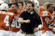 AUSTIN, TX - SEPTEMBER 5: Defensive coordinator Will Muschamp of the Texas Longhorns gets pumped up after a turnover by the Louisiana Monroe Warhawks in the first quarter on September 5, 2009 at Darrell K Royal-Texas Memorial Stadium in Austin, Texas. (Photo by Brian Bahr/Getty Images)