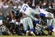 PHILADELPHIA - NOVEMBER 08: Donovan McNabb #5 of the Philadelphia Eagles is stopped on a 4 and 1 play in the fourth quarter against Keith Brooking #51 of the Dallas Cowboys at Lincoln Financial Field on November 8, 2009 in Philadelphia, Pennsylvania. (Photo by Al Bello/Getty Images)