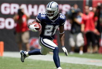 TAMPA, FL - SEPTEMBER 13:  Cornerback Mike Jenkins #21 of the Dallas Cowboys returns a blocked field goal against the Tampa Bay Buccaneers during the game at Raymond James Stadium on September 13, 2009 in Tampa, Florida.  (Photo by J. Meric/Getty Images)