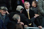 HULL, ENGLAND - NOVEMBER 08: Adam Pearson, Hull City Chairman talks to a supporter during the Barclays Premier League match between Hull City and Stoke City at the KC Stadium on November 8, 2009 in Hull, England.  (Photo by Michael Regan/Getty Images)