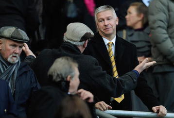 HULL, ENGLAND - NOVEMBER 08: Adam Pearson, Hull City Chairman talks to a supporter during the Barclays Premier League match between Hull City and Stoke City at the KC Stadium on November 8, 2009 in Hull, England.  (Photo by Michael Regan/Getty Images)