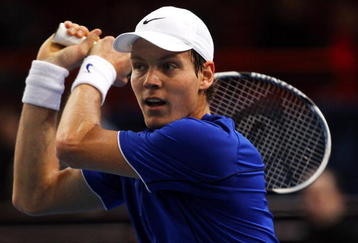 PARIS - NOVEMBER 09:  Tomas Berdych of the Czech Republic in action during his match against Vincent Millot of France during the ATP Masters Series at the Palais Omnisports De Paris-Bercy on November 9, 2009 in Paris, France.  (Photo by Clive Rose/Getty Images)