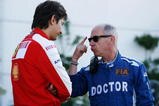 BUDAPEST, HUNGARY - JULY 25:  F.I.A. doctor Gary Hartstein talks with a Ferrari team member following qualifying for the Hungarian Formula One Grand Prix at the Hungaroring on July 25, 2009 in Budapest, Hungary.  (Photo by Paul Gilham/Getty Images)