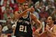 CHICAGO - OCTOBER 29: Tim Duncan #21 of the San Antonio Spurs passes the ball under pressure from Joakim Noah #13 of the Chicago Bulls at the United Center on October 29, 2009 in Chicago, Illinois. The Bulls defeated the Spurs 92-85. (Photo by Jonathan Daniel/Getty Images)