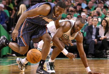 BOSTON, MA - OCTOBER 28:  Derrick Brown #4 of the Charlotte Bobcats fights for a loose ball with Shelden Williams #13 of the  Boston Celtics at the TD Banknorth Garden on October 28, 2009 in Boston, Massachusetts. NOTE TO USER: User expressly acknowledges and agrees that, by downloading and/or using this Photograph, user is consenting to the terms and conditions of the Getty Images License Agreement. (Photo by Jim Rogash/Getty Images)