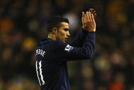 WOLVERHAMPTON, ENGLAND - NOVEMBER 07:  Robin van Persie of Arsenal salutes the fans at the end of the Barclays Premier League match between Wolverhampton Wanderers and Arsenal at Molineux on November 7, 2009 in Wolverhampton, England.  (Photo by Richard Heathcote/Getty Images)