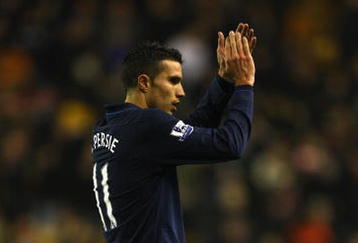 WOLVERHAMPTON, ENGLAND - NOVEMBER 07:  Robin van Persie of Arsenal salutes the fans at the end of the Barclays Premier League match between Wolverhampton Wanderers and Arsenal at Molineux on November 7, 2009 in Wolverhampton, England.  (Photo by Richard Heathcote/Getty Images)