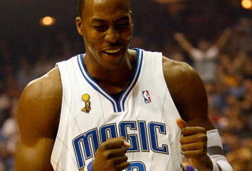 ORLANDO, FL - JUNE 11: Dwight Howard #12 of the Orlando Magic reacts in the first quarter of Game Four of the 2009 NBA Finals against the Los Angeles Lakers on June 11, 2009 at Amway Arena in Orlando, Florida.  NOTE TO USER:  User expressly acknowledges and agrees that, by downloading and or using this photograph, User is consenting to the terms and conditions of the Getty Images License Agreement.  (Photo by Chris Graythen/Getty Images)