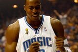 ORLANDO, FL - JUNE 11: Dwight Howard #12 of the Orlando Magic reacts in the first quarter of Game Four of the 2009 NBA Finals against the Los Angeles Lakers on June 11, 2009 at Amway Arena in Orlando, Florida.  NOTE TO USER:  User expressly acknowledges and agrees that, by downloading and or using this photograph, User is consenting to the terms and conditions of the Getty Images License Agreement.  (Photo by Chris Graythen/Getty Images)