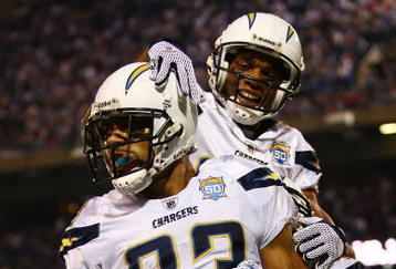 EAST RUTHERFORD, NJ - NOVEMBER 08: Vincent Jackson #83 of the San Diego Chargers celebrates his go-ahead touchdown with teammate Malcolm Floyd #80 against the New York Giants on November 8, 2009 at Giants Stadium in East Rutherford, New Jersey.  (Photo by Chris McGrath/Getty Images)