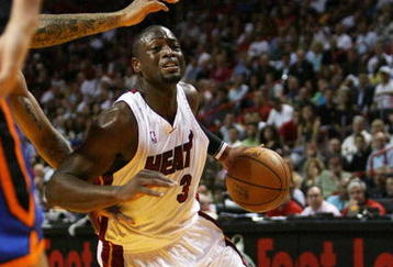 MIAMI - OCTOBER 28:  Dwyane Wade #3 of the Miami Heat drives to the basket while taking on the New York Knicks at AmericanAirlines Arena on October 28, 2009 in Miami, Florida. NOTE TO USER: User expressly acknowledges and agrees that, by downloading and/or using this Photograph, user is consenting to the terms and conditions of the Getty Images License Agreement.  (Photo by Doug Benc/Getty Images)