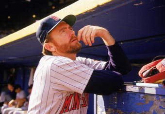 1989:  Bert Blyleven of the Minnesota Twins stands in the dugout during a game in the 1989 season.  (Photo by: Jonathan Daniel/Getty Images)