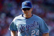 KANSAS CITY, MO - JUNE 20:  Mark Teahen #24 of the Kansas City Royals runs on the field against the St. Louis Cardinals during the game on June 20, 2009 at Kauffman Stadium in Kansas City, Missouri. (Photo by Jamie Squire/Getty Images)