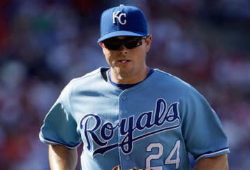 KANSAS CITY, MO - JUNE 20:  Mark Teahen #24 of the Kansas City Royals runs on the field against the St. Louis Cardinals during the game on June 20, 2009 at Kauffman Stadium in Kansas City, Missouri. (Photo by Jamie Squire/Getty Images)