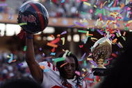 DALLAS - JANUARY 02:  Dexter McCluster #22 of the Mississippi Rebels celebrates a 47-34 win against the Texas Tech Red Raiders during the AT&T Cotton Bowl on January 2, 2009 at the Cotton Bowl in Dallas, Texas.  (Photo by Ronald Martinez/Getty Images)