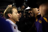 TUSCALOOSA, AL - NOVEMBER 03: Head coach Les Miles of the LSU Tigers is congratulated by head coach Nick Saban of the Alabama Crimson Tide at Bryant-Denny Stadium on November 3, 2007 in Tuscaloosa, Alabama. LSU defeated Alabama 41-34. (Photo by Doug Benc/Getty Images)