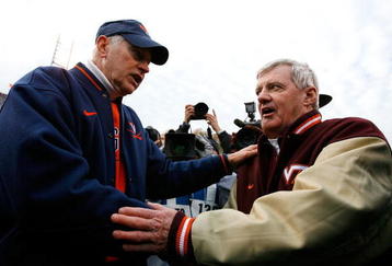 CHARLOTTESVILLE, VA - NOVEMBER 24:  Head coach Al Groh (L) of the Virginia Cavaliers congratulates head coach Frank Beamer of the Virginia Tech Hokies after after the Hokies 33-21 win at Scott Stadium on November 24, 2007 in Charlottesville, Virginia.  (Photo by Kevin C. Cox/Getty Images)