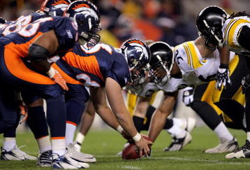 DENVER - OCTOBER 21:  The Pittsburgh Steelers face off at the line of scrimmage against the Denver Broncos at Invesco Field at Mile High on October 21, 2007 in Denver, Colorado. The Broncos defeated the Steelers 31-28.  (Photo by Doug Pensinger/Getty Images)