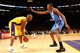LOS ANGELES - FEBRUARY 10: Kobe Bryant #24 of the Los Angeles Lakers controls the ball against Kevin Durant #35 of the Oklahoma City Thunder on February 10, 2009 at Staples Center in Los Angeles, California. NOTE TO USER: User expressly acknowledges and agrees that, by downloading and/or using this Photograph, user is consenting to the terms and conditions of the Getty Images License Agreement. (Photo by Stephen Dunn/Getty Images)
