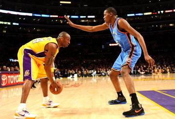 LOS ANGELES - FEBRUARY 10: Kobe Bryant #24 of the Los Angeles Lakers controls the ball against Kevin Durant #35 of the Oklahoma City Thunder on February 10, 2009 at Staples Center in Los Angeles, California.   NOTE TO USER: User expressly acknowledges and agrees that, by downloading and/or using this Photograph, user is consenting to the terms and conditions of the Getty Images License Agreement. (Photo by Stephen Dunn/Getty Images)