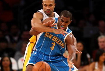 LOS ANGELES - NOVEMBER 8: Chris Paul #3 of the New Orleans Hornets tries to catch a pass as Derek Fisher #3 of the Los Angeles Lakers defends on November 8, 2009 at Staples Center in Los Angeles, California. The Lakers won 104-88.  NOTE TO USER: User expressly acknowledges and agrees that, by downloading and/or using this Photograph, user is consenting to the terms and conditions of the Getty Images License Agreement.   (Photo by Stephen Dunn/Getty Images)