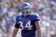 LAWRENCE, KS - SEPTEMBER 19:  Linebacker Huldon Tharp #34 of the Kansas Jayhawks gets ready on the line during the game against the Duke Blue Devils on Kivisto Field at Memorial Stadium on September 19, 2009 in Lawrence, Kansas. (Photo by Jamie Squire/Getty Images)