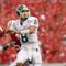 MADISON, WI - SEPTEMBER 26: Kirk Cousins #8 of the Michigan State Spartans looks to pass the ball against the Wisconsin Badgers on September 26, 2009 at Camp Randall Stadium in Madison, Wisconsin. (Photo by Jonathan Daniel/Getty Images)