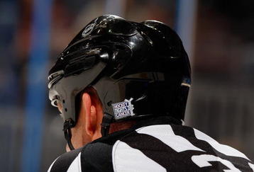 ATLANTA - OCTOBER 29:  Referee Brad Meier #34 wears a Hockey Fights Cancer sticker on his helmet during the game between of the Washington Capitals the Atlanta Thrashers at Philips Arena on October 29, 2009 in Atlanta, Georgia.  (Photo by Kevin C. Cox/Getty Images)