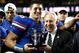 ATLANTA - DECEMBER 06:  Quarterback Tim Tebow #15 of the Florida Gators receives the Most Valuable Player award from SEC Commissioner Mike Slive after the Gators 31-20 win over the Alabama Crimson Tide in the SEC Championship on December 6, 2008 at the Georgia Dome in Atlanta, Georgia.  (Photo by Kevin C. Cox/Getty Images)