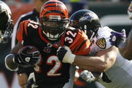 CINCINNATI - NOVEMBER 8: Cedric Benson #32 of the Cincinnati Bengals is tackled by Kelly Gregg #97 of the Baltimore Ravens at Paul Brown Stadium on November 8, 2009 in Cincinnati, Ohio. (Photo by John Sommers II/Getty Images)