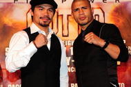 BEVERLY HILLS, CA - SEPTEMBER 14:  Manny Pacquiao and  Miguel Cotto pose for pictures during the press conference at the Beverly Hills Hotel on September 14, 2009 in Beverly Hills, California.  (Photo by Jacob De Golish/Jacob De Golish)