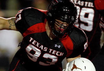 LUBBOCK, TX - NOVEMBER 01:  Colby Whitlock #93 of the Texas Tech Red Raiders tackles Chris Ogbonnaya #3 of the Texas Longhorns in the Longhorns endzone for a safety during the first half of the game on November 1, 2008 at Jones Stadium in Lubbock, Texas.  (Photo by Jamie Squire/Getty Images)