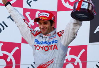 SUZUKA, JAPAN - OCTOBER 04:  Jarno Trulli of Italy and Toyota celebrates on the podium after finishing second during the Japanese Formula One Grand Prix at Suzuka Circuit on October 4, 2009 in Suzuka, Japan.  (Photo by Mark Thompson/Getty Images)