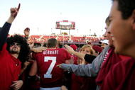 PALO ALTO, CA - NOVEMBER 07: Toby Gerhart #7 of the Stanford Cardinal is surrounded by fans after the Cardinal upset the Oregon Ducks at Stanford Stadium on November 7, 2009 in Palo Alto, California. (Photo by Ezra Shaw/Getty Images)