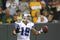 GREEN BAY - SEPTEMBER 21:  Miles Austin #19 of the Dallas Cowboys celebrates his touchdown against the Green  Bay Packers at Lambeau Field on September 21, 2008 in Green Bay, Wisconsin. The Cowboys defeated the Packers in 27- 16.  (Photo by Tom Hauck/Getty Images)