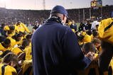 BERKELEY, CA - NOVEMBER 07:  Head coach Jeff Tedford of the California Golden Bears prays as teammate Jahvid Best is attended to by medical personnel after landing on his back after scoring a touchdown against the Oregon State Beavers at California Memorial Stadium on November 7, 2009 in Berkeley, California.  (Photo by Jed Jacobsohn/Getty Images)