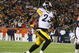 DENVER - NOVEMBER 09: Tyrone Carter #23 of the Pittsburgh Steelers runs for a touchdown after making an interception in the second quarter against the Denver Broncos at Invesco Field at Mile High on November 09, 2009 in Denver, Colorado. (Photo by Doug Pensinger/Getty Images)