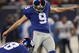 EAST RUTHERFORD, NJ - NOVEMBER 8: Lawrence Tynes #9 of the New York Giants kicks the ball against the San Diego Chargers at Giants Stadium on November 8, 2009 in East Rutherford, New Jersey. The Chargers defeated the Giants 21-20.  (Photo by Nick Laham/Getty Images)