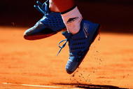 MADRID, SPAIN - MAY 16:  Novak Djokovic of Serbia serves against Rafael Nadal of Spain  in their semi-final during the Madrid Open tennis tournament at the Caja Magica on May 16, 2009 in Madrid, Spain.  (Photo by Clive Brunskill/Getty Images)