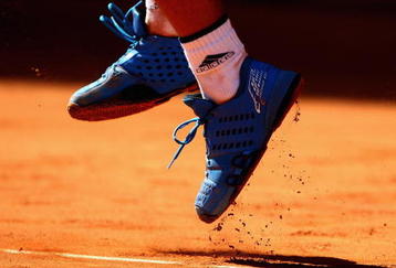 MADRID, SPAIN - MAY 16:  Novak Djokovic of Serbia serves against Rafael Nadal of Spain  in their semi-final during the Madrid Open tennis tournament at the Caja Magica on May 16, 2009 in Madrid, Spain.  (Photo by Clive Brunskill/Getty Images)