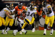 DENVER - NOVEMBER 09: Rashard Mendenhall #34 of the Pittsburgh Steelers rushes 34 yards for a first down against the Denver Broncos in the fourth quarter during NFL action at Invesco Field at Mile High on November 9, 2009 in Denver, Colorado. The Steelers defeated the Broncos 28-10. (Photo by Doug Pensinger/Getty Images)