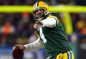 GREEN BAY, WI - JANUARY 20:  Quarterback Brett Favre #4 of the Green Bay Packers throws the ball during the NFC championship game against the New York Giants on January 20, 2008 at Lambeau Field in Green Bay, Wisconsin. The Giants defeated the Packers 23-20 in overtime to advance to the Superbowl XLII.  (Photo by Jed Jacobsohn/Getty Images)