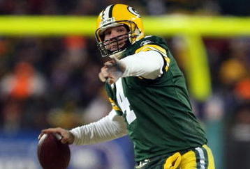 GREEN BAY, WI - JANUARY 20:  Quarterback Brett Favre #4 of the Green Bay Packers throws the ball during the NFC championship game against the New York Giants on January 20, 2008 at Lambeau Field in Green Bay, Wisconsin. The Giants defeated the Packers 23-20 in overtime to advance to the Superbowl XLII.  (Photo by Jed Jacobsohn/Getty Images)