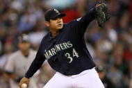 SEATTLE - SEPTEMBER 18:  Starting pitcher Felix Hernandez #34 of the Seattle Mariners pitches against the New York Yankees on September 18, 2009 at Safeco Field in Seattle, Washington. (Photo by Otto Greule Jr/Getty Images)