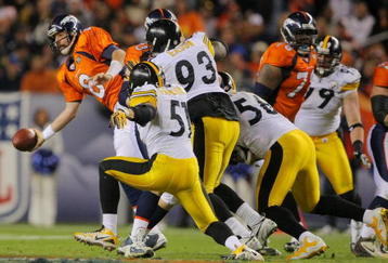 DENVER - NOVEMBER 09: Kyle Orton #8 of the Denver Broncos tries to get rid of the ball as he is pressured by the Pittsburgh Steelers at Invesco Field at Mile High on November 09, 2009 in Denver, Colorado. (Photo by Doug Pensinger/Getty Images)