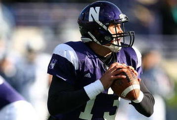 EVANSTON, IL - OCTOBER 31: Mike Kafka #13 of the Northwestern Wildcats looks for a receiver against the Penn State Nittany Lions at Ryan Field on October 31, 2009 in Evanston, Illinois. Penn State defeated Northwestern 34-13. (Photo by Jonathan Daniel/Getty Images)