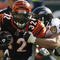 CINCINNATI - NOVEMBER 8: Cedric Benson #32 of the Cincinnati Bengals is tackled by Kelly Gregg #97 of the Baltimore Ravens at Paul Brown Stadium on November 8, 2009 in Cincinnati, Ohio.  (Photo by John Sommers II/Getty Images)